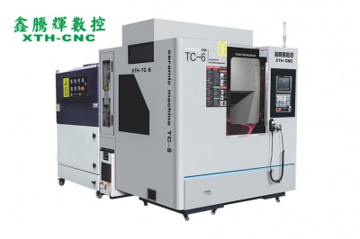 加工石墨材料的數(shù)控精雕機(jī) 